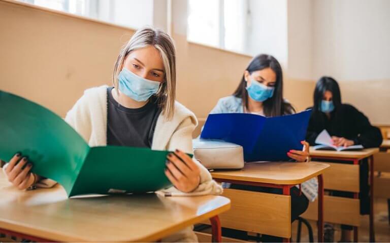 high school students wearing PPE